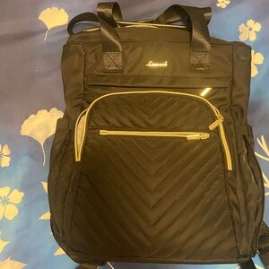 Black Backpack with Gold Accents